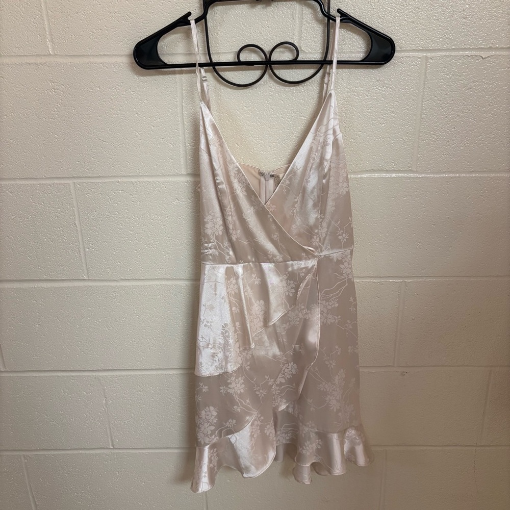 Silver floral Altar’d State minidress with crossover V-neckline and ruffles